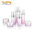 Round pink plastic container cosmetic pump lotion spray acrylic bottle and cream jar skin care packaging